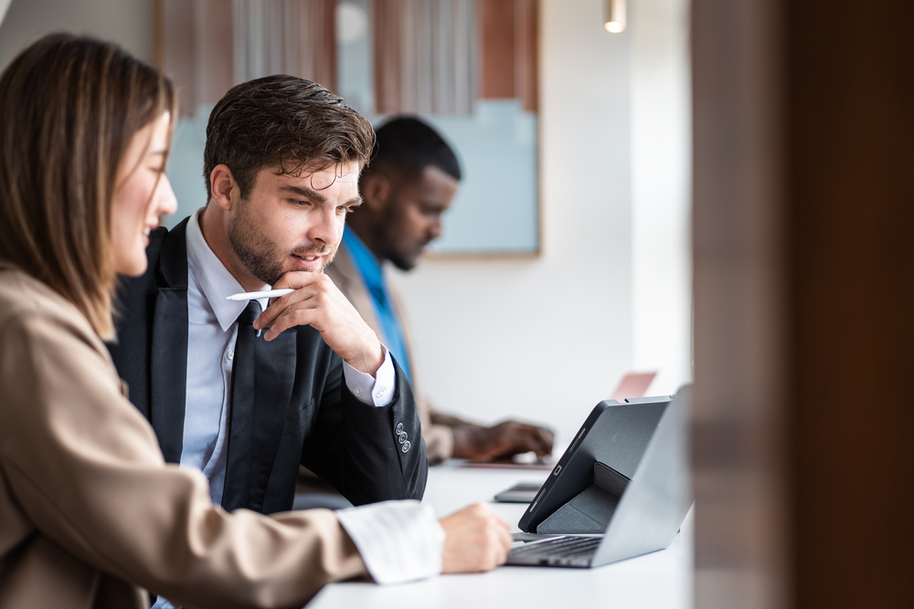 mature caucasian ceo businessman leader with diverse coworkers t